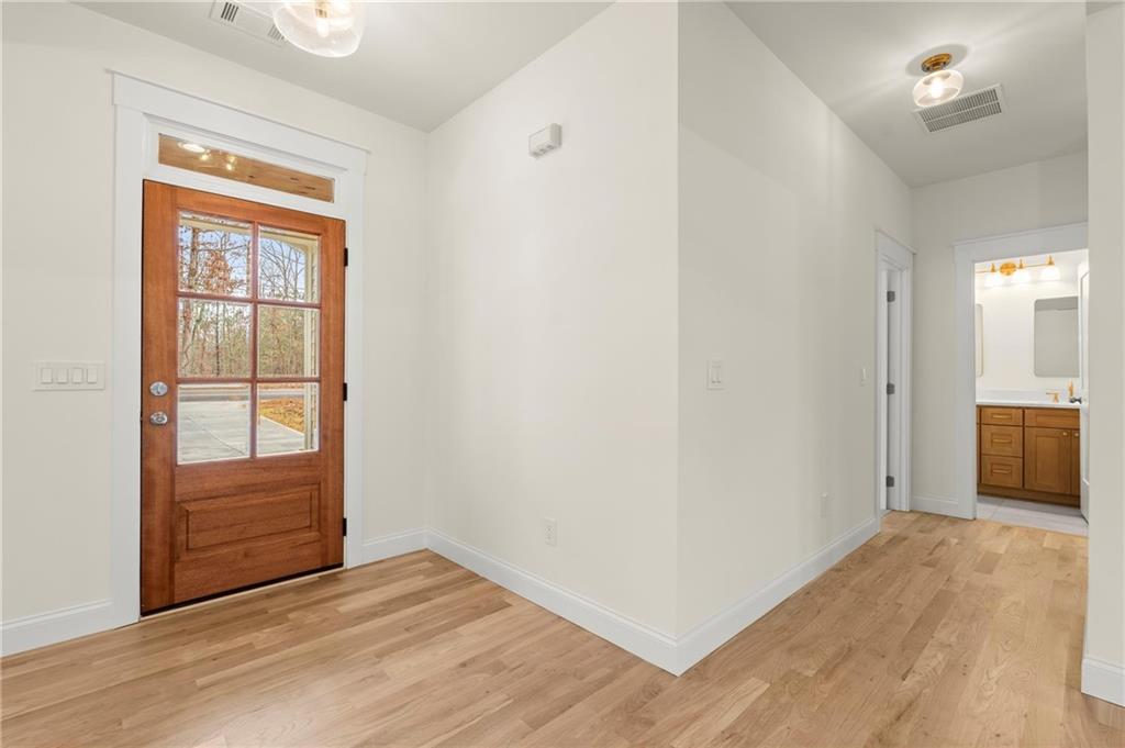2020 Darby Road Waleska, GA 30183 - Photo 8 of 49 a view of a room with wooden floor and cabinet