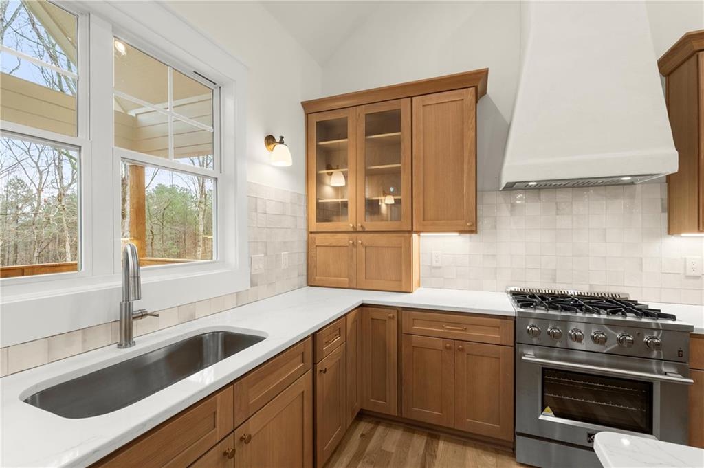 2020 Darby Road Waleska, GA 30183 - Photo 10 of 49 a kitchen with a sink stove and cabinets