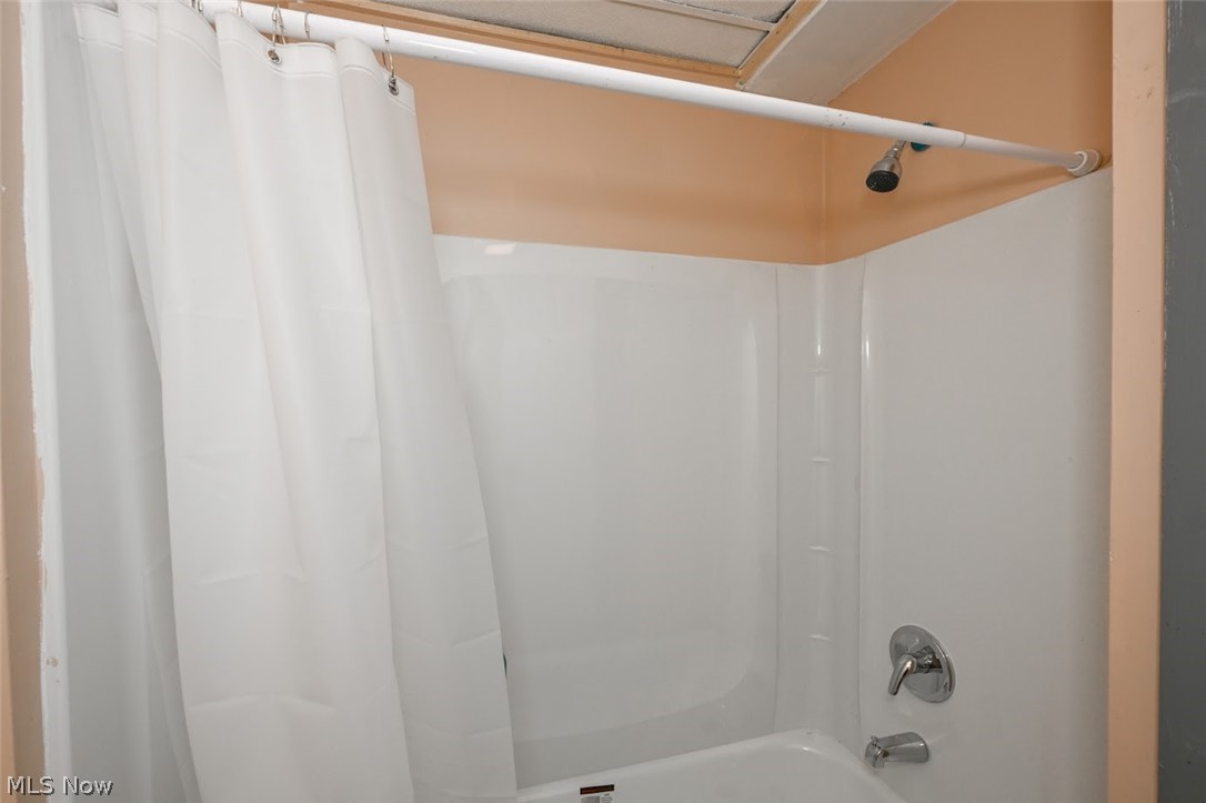868 North Main Street Akron, OH 44310 - Photo 27 of 30 Full bathroom featuring shower / bath combo with shower curtain