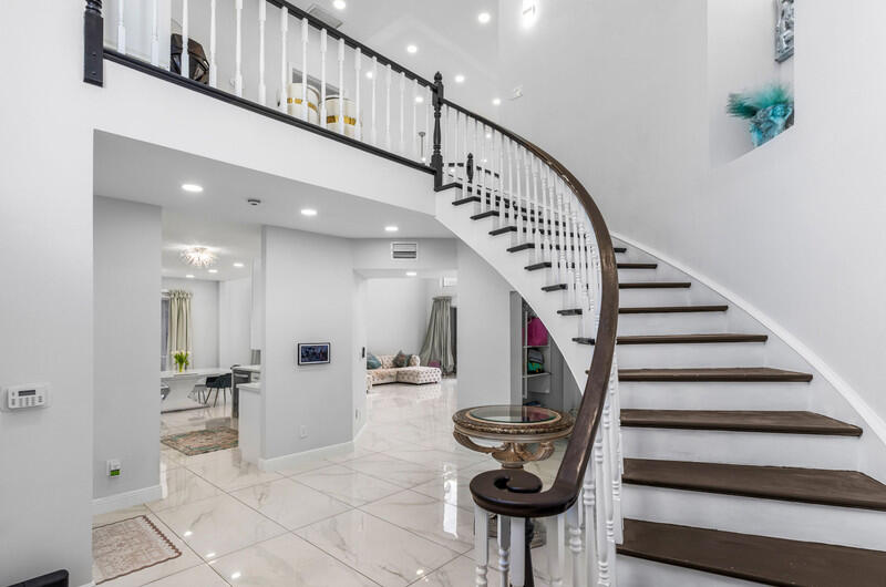 7748 Travelers Tree Drive Boca Raton, FL 33433 - Photo 1 of 31 a view of entryway and hall with wooden floor