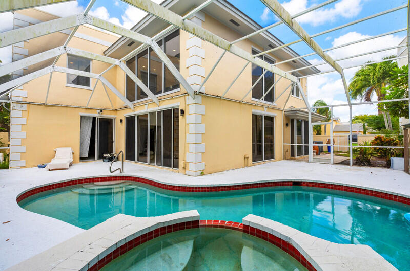 7748 Travelers Tree Drive Boca Raton, FL 33433 - Photo 27 of 31 a view of a house with pool and porch