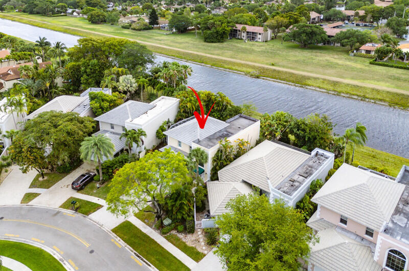 7748 Travelers Tree Drive Boca Raton, FL 33433 - Photo 3 of 31 an aerial view of a house with a yard basket ball court and outdoor seating
