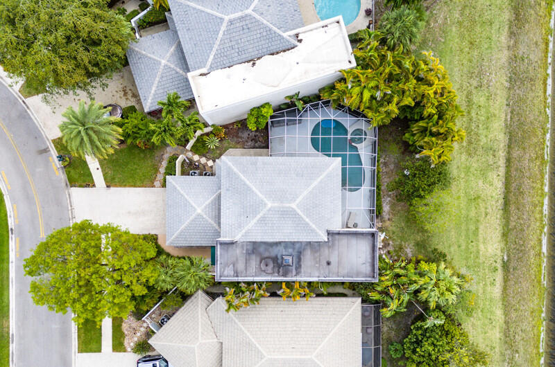 7748 Travelers Tree Drive Boca Raton, FL 33433 - Photo 4 of 31 an aerial view of a house with a yard and garden