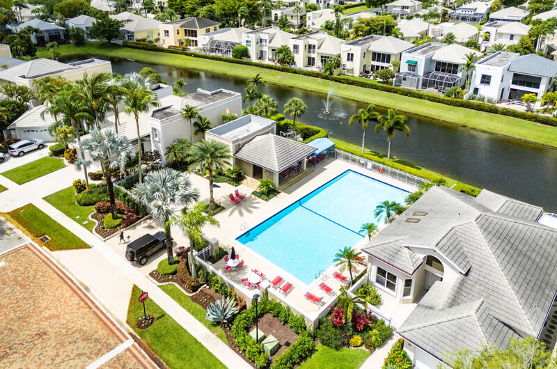 7748 Travelers Tree Drive Boca Raton, FL 33433 - Photo 7 of 31 an aerial view of a house with a lake view