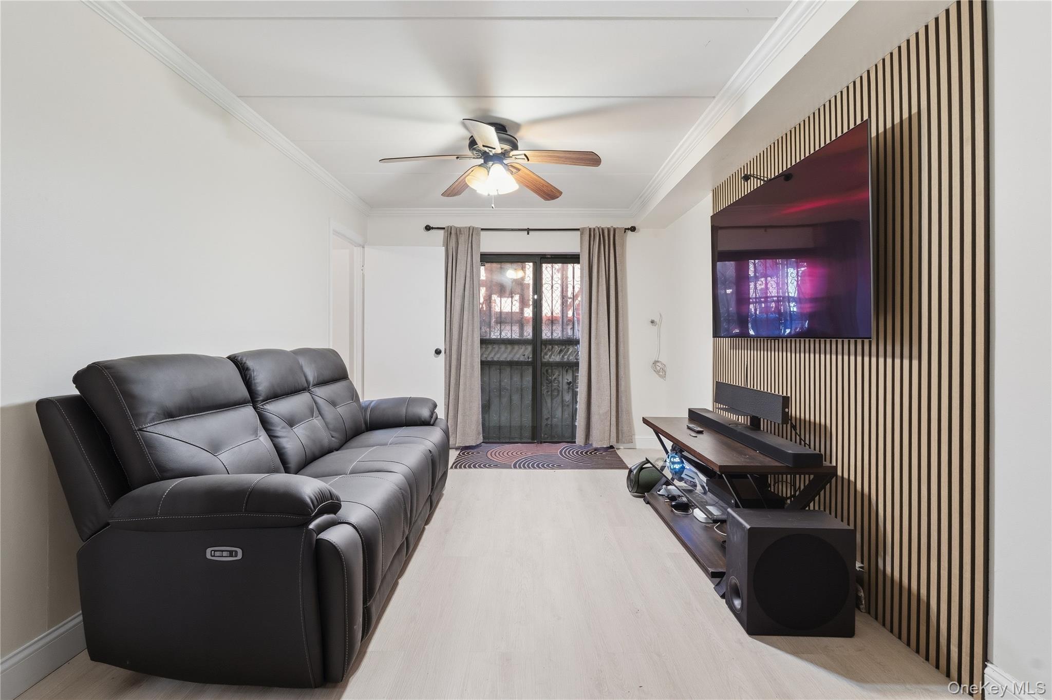 863 Home Street Bronx, NY 10459 - Photo 11 of 46 a living room with furniture and a window