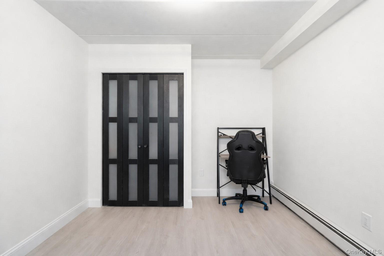 863 Home Street Bronx, NY 10459 - Photo 16 of 46 a view of entryway with wooden floor