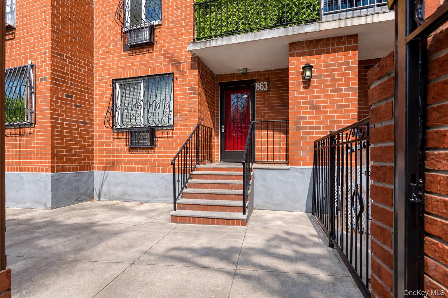863 Home Street Bronx, NY 10459 - Photo 2 of 46 a view of a house with stairs and a yard