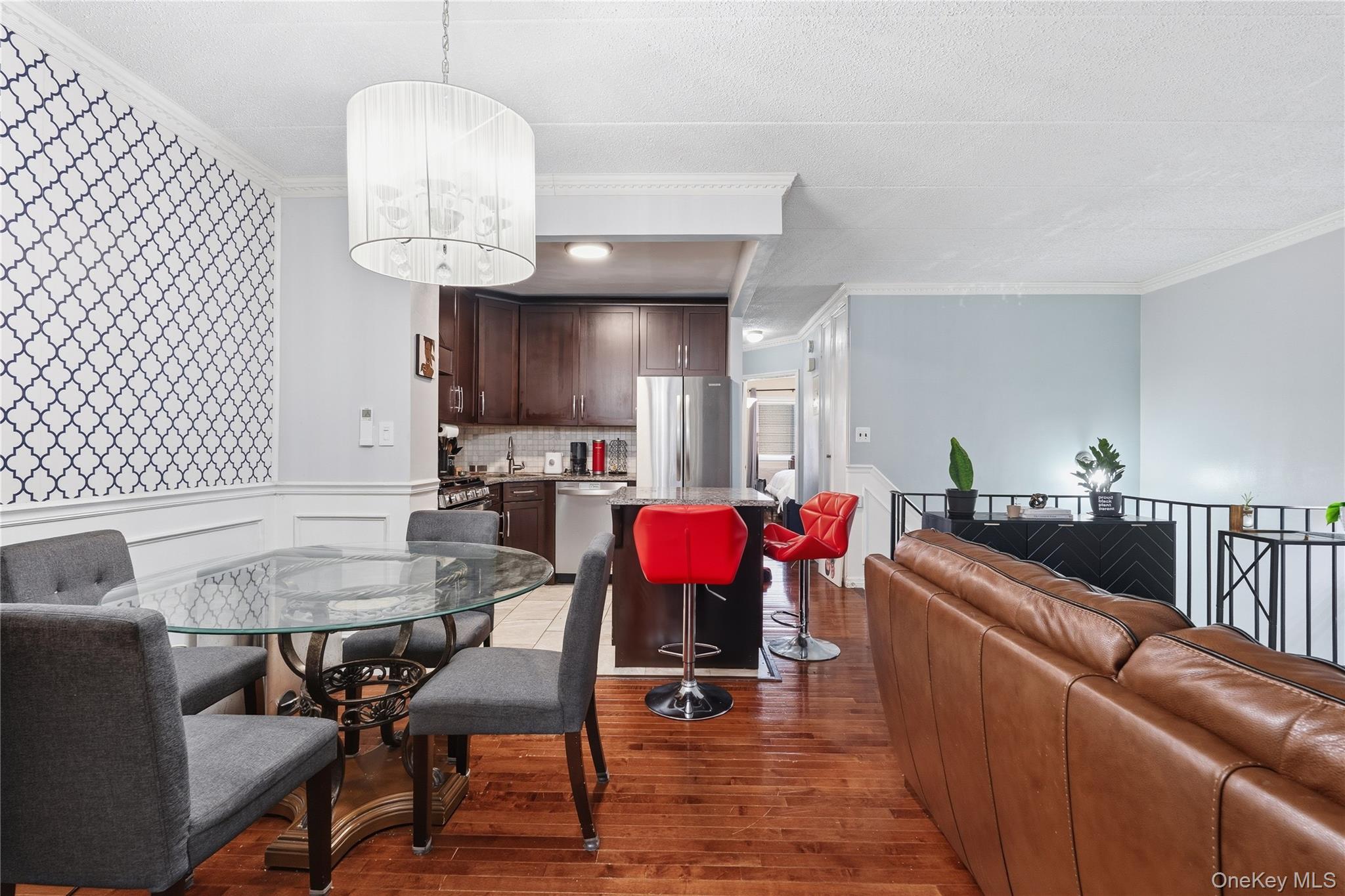 863 Home Street Bronx, NY 10459 - Photo 29 of 46 a view of kitchen dining table and chairs