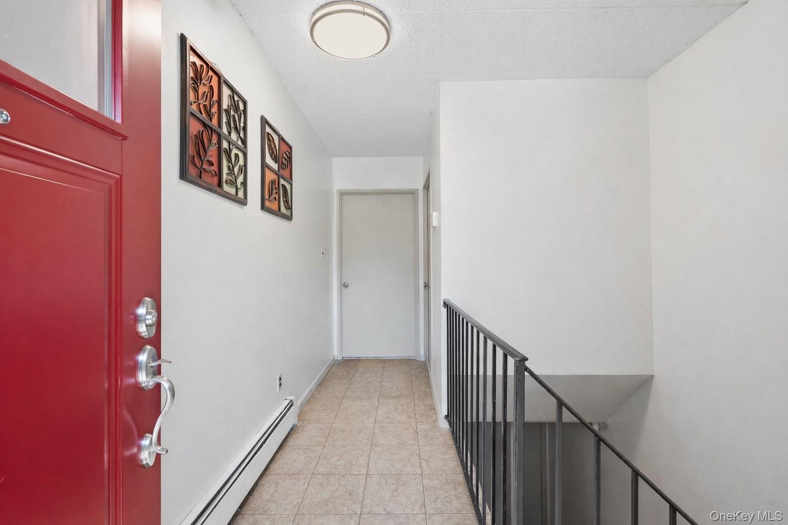 863 Home Street Bronx, NY 10459 - Photo 3 of 46 a view of a hallway with entryway
