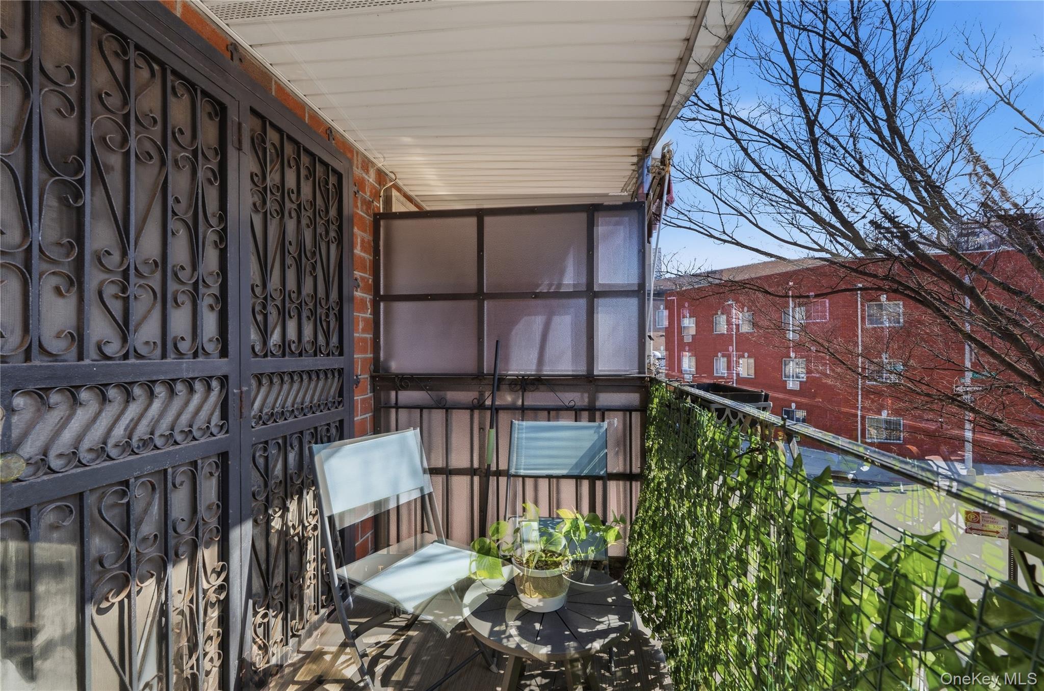863 Home Street Bronx, NY 10459 - Photo 36 of 46 a balcony with an outdoor space