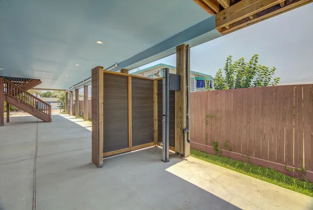 a view of a balcony with chair