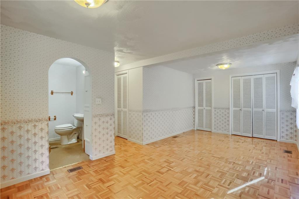 5035 Bear Run Road Cranberry Township, PA 16066 - Photo 18 of 47 a bathroom with a sink and a toilet