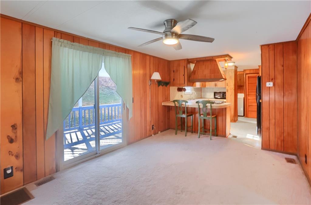 5035 Bear Run Road Cranberry Township, PA 16066 - Photo 22 of 47 wooden floor in an empty room with a window