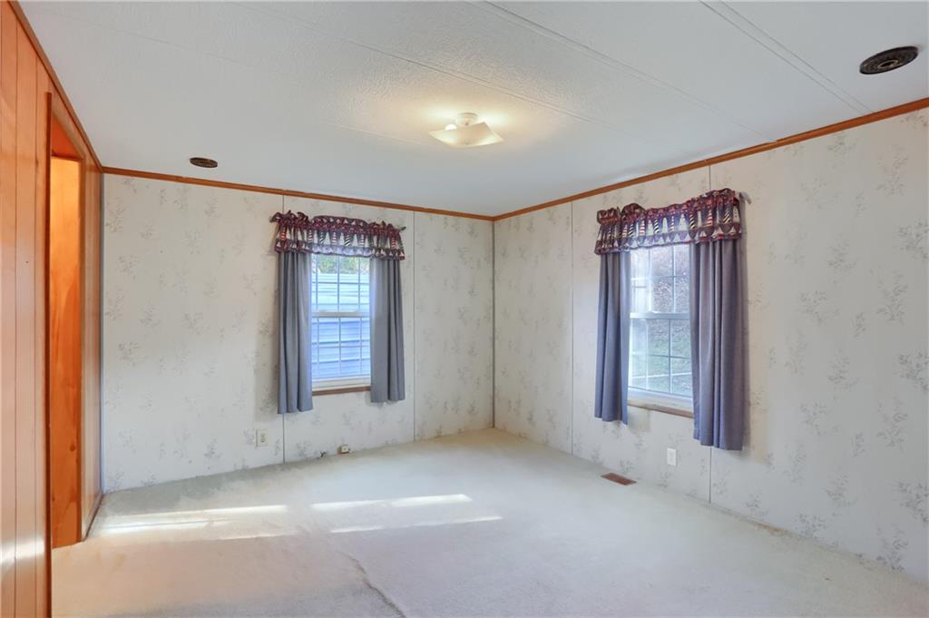 5035 Bear Run Road Cranberry Township, PA 16066 - Photo 33 of 47 an empty room with windows and closet