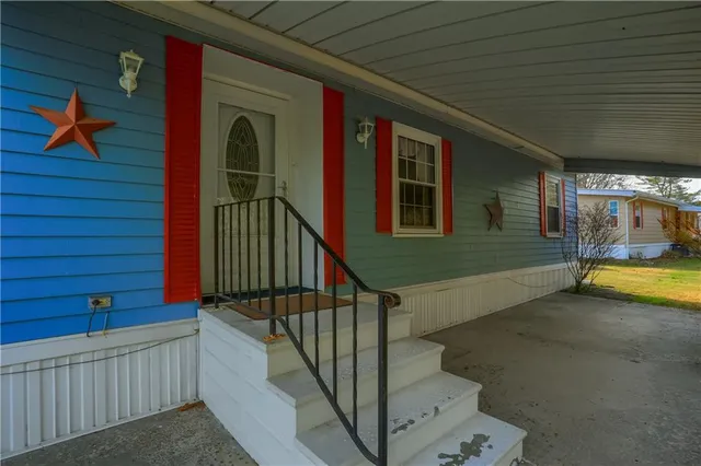 a view of swimming pool with seating space