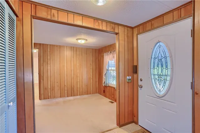 a view of a hallway with entryway