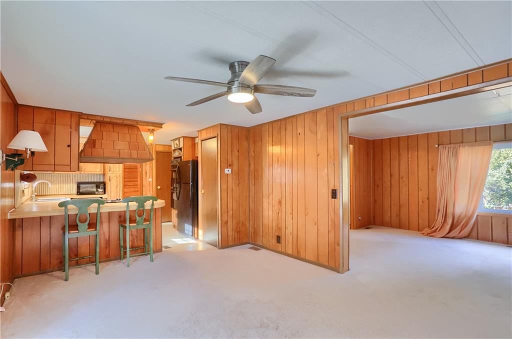 5035 Bear Run Road Cranberry Township, PA 16066 - Photo 8 of 47 an empty room with windows & cabinet