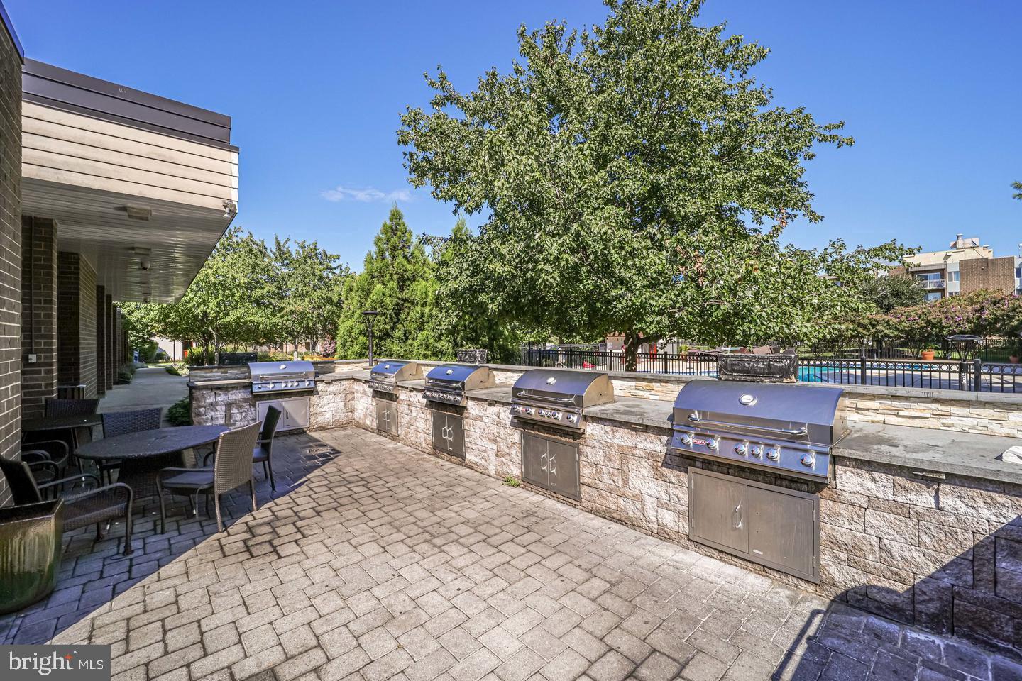 75 South Reynolds Street, Unit 101 Alexandria, VA 22304 - Photo 21 of 38 a outdoor view with a sitting space