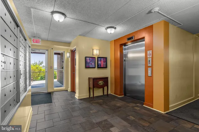 a view of a hallway with an empty room