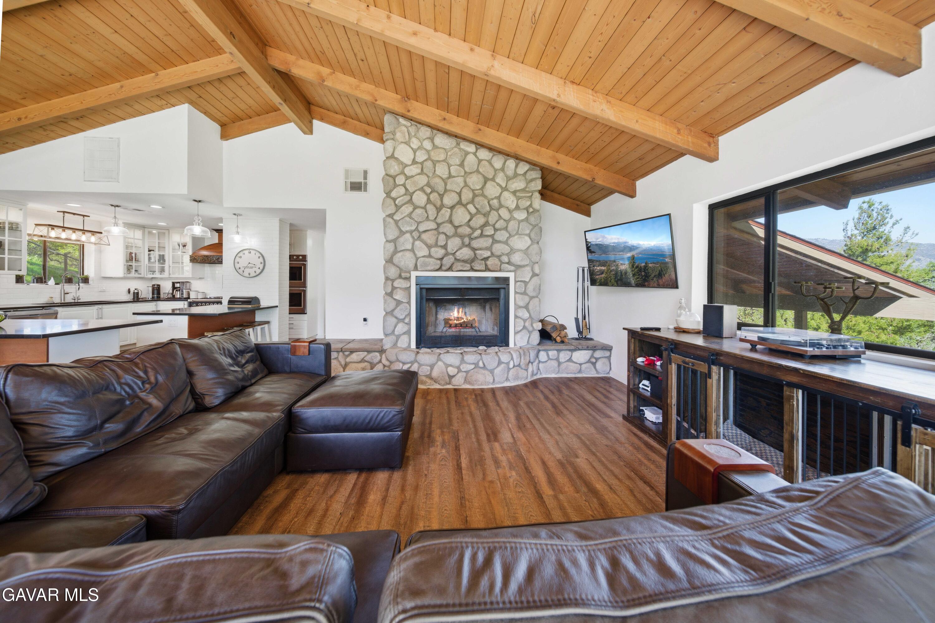 23580 Timberline Way Tehachapi, CA 93561 - Photo 9 of 50 a living room with furniture and a fireplace