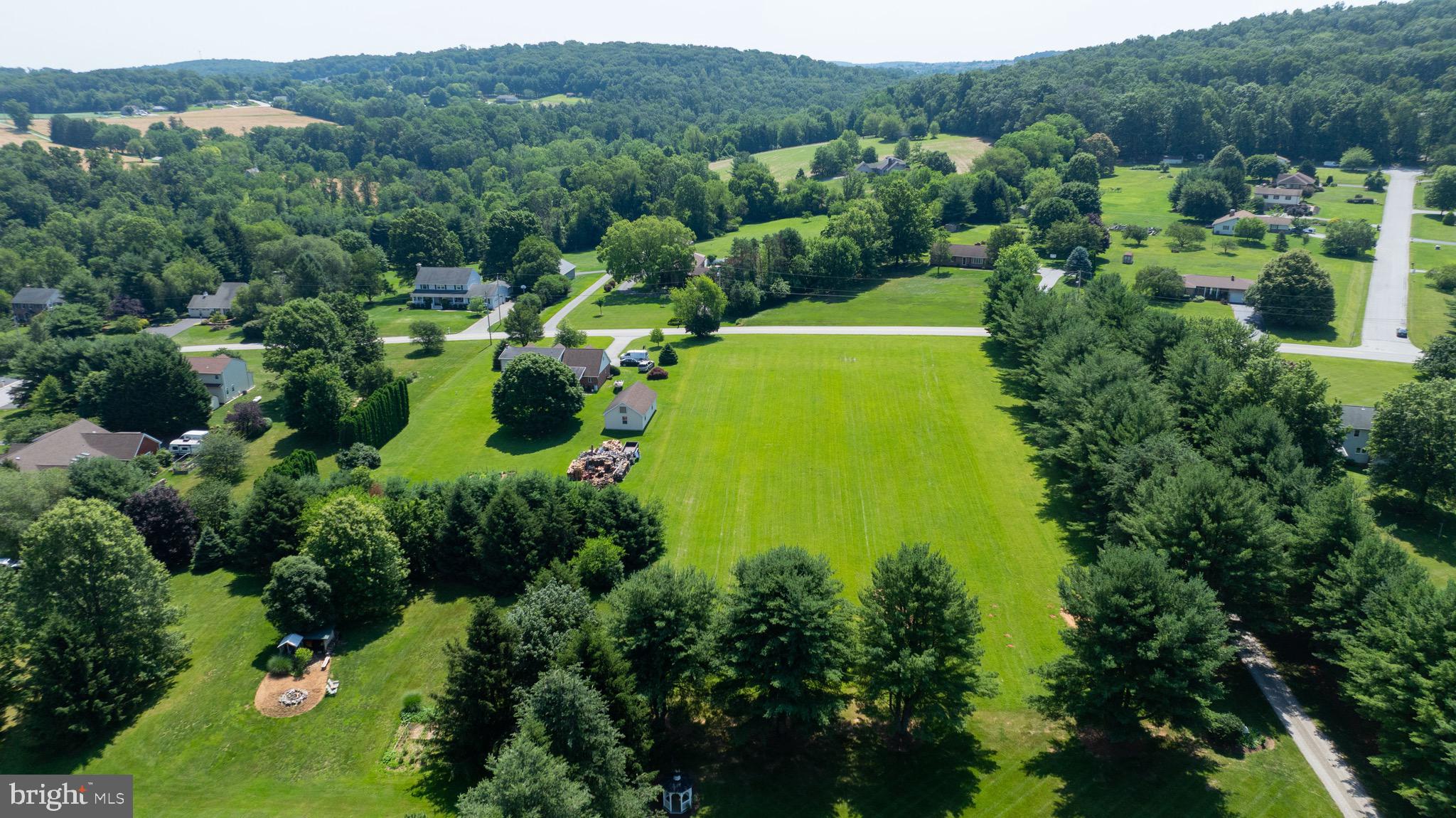 445 Steinfelt Road Red Lion, PA 17356 - Photo 3 of 16 an aerial view of a house with a yard
