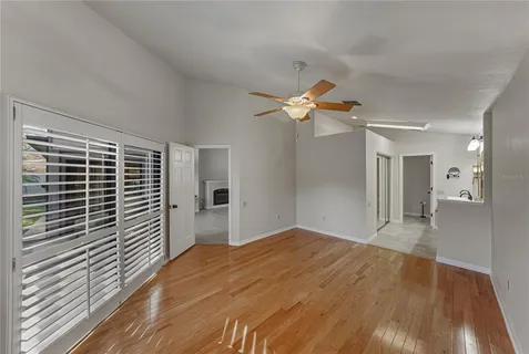 a view of a porch with a floor to ceiling windows