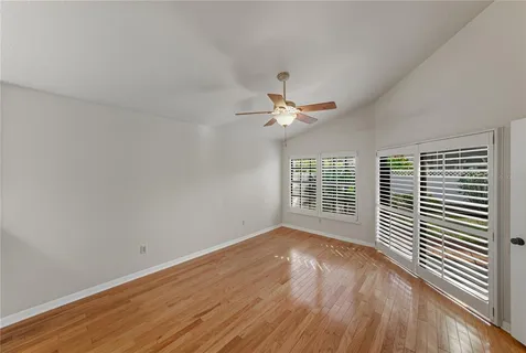 a view of a glass door with a balcony