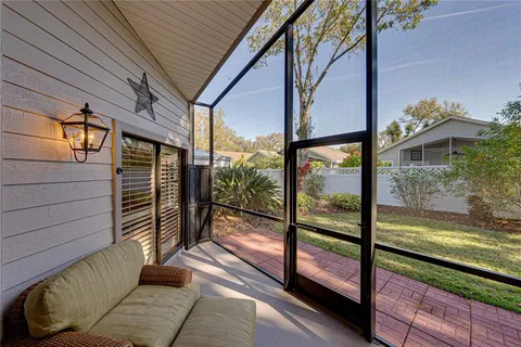 a view of a house with a tree