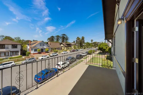 a view of balcony with furniture