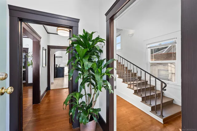 a view of staircase with glass door and glass door
