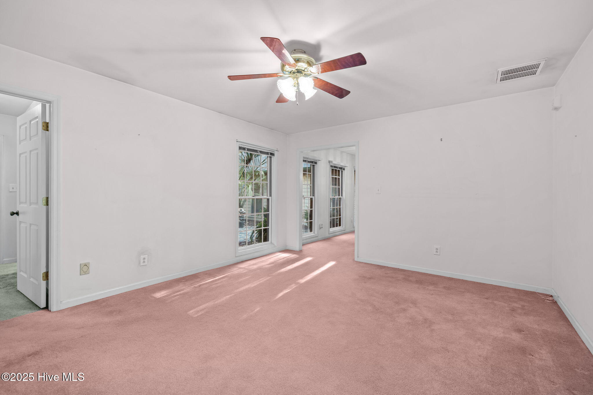 119 White Oak Bluff Road, Unit A Stella, NC 28582 - Photo 18 of 48 One hall to dining and one to another bedroom, bathroom and garage.