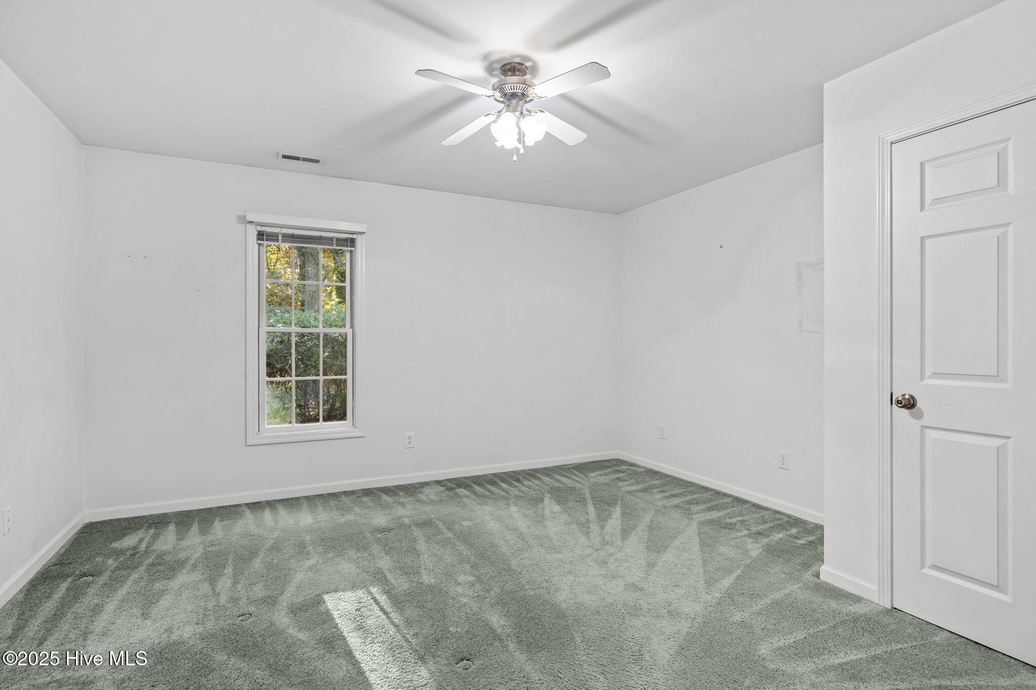 119 White Oak Bluff Road, Unit A Stella, NC 28582 - Photo 19 of 48 Spacious Front Bedroom