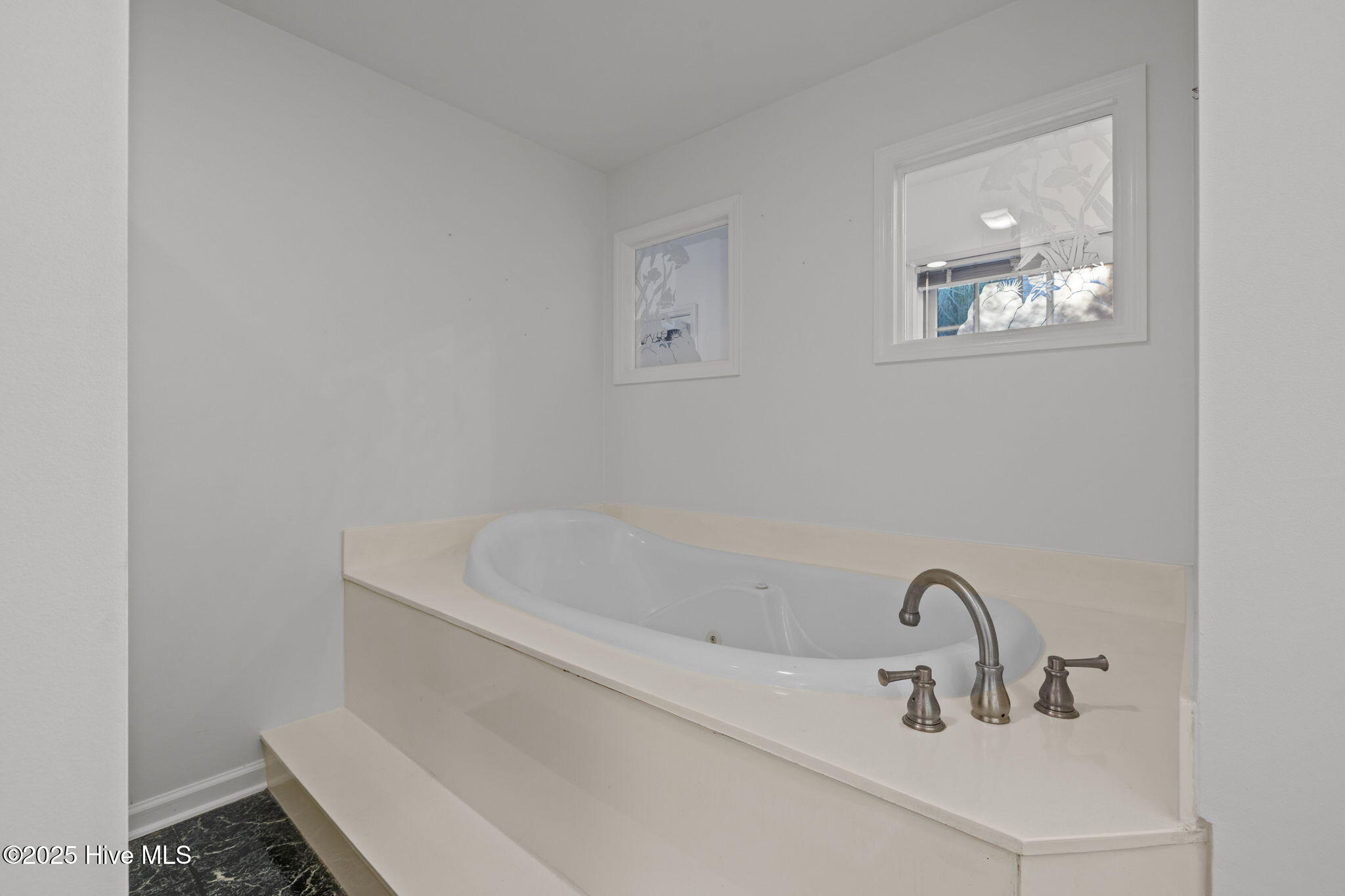 119 White Oak Bluff Road, Unit A Stella, NC 28582 - Photo 36 of 48 Soaking Tub, Custom Glass Accents above