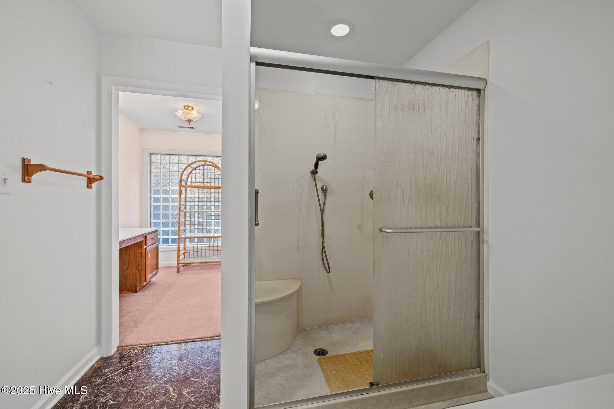 119 White Oak Bluff Road, Unit A Stella, NC 28582 - Photo 37 of 48 Shower and Doorway to Dressing room and 2nd Walk-in Closet