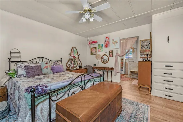 a bathroom with a toilet and a shower curtain