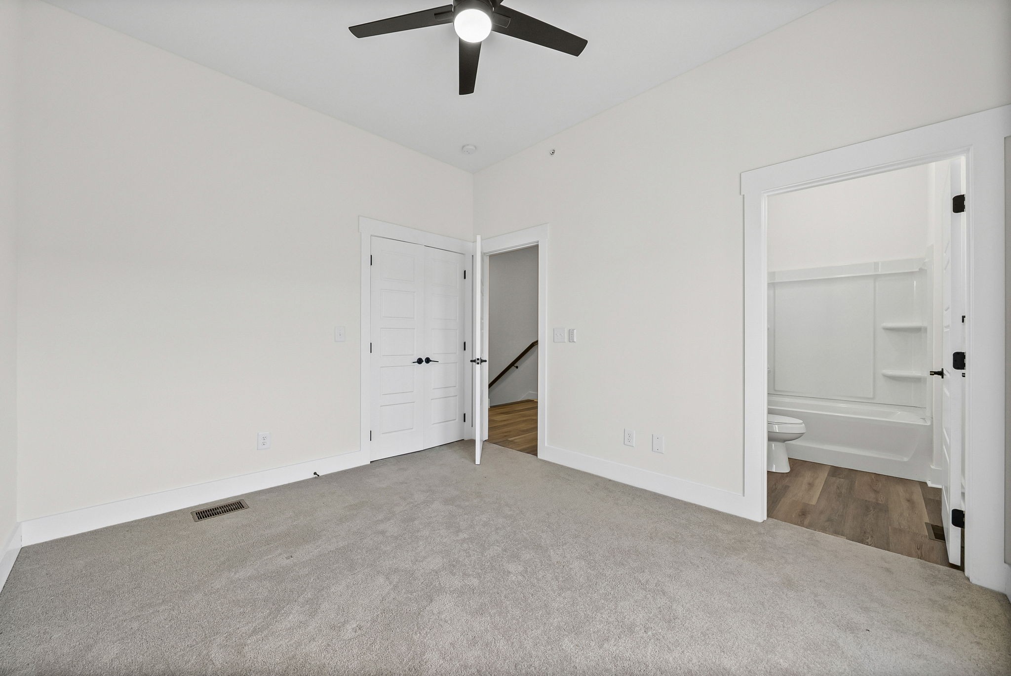 442 Centre Street Pleasant View, TN 37146 - Photo 31 of 47 an empty room with closet and windows
