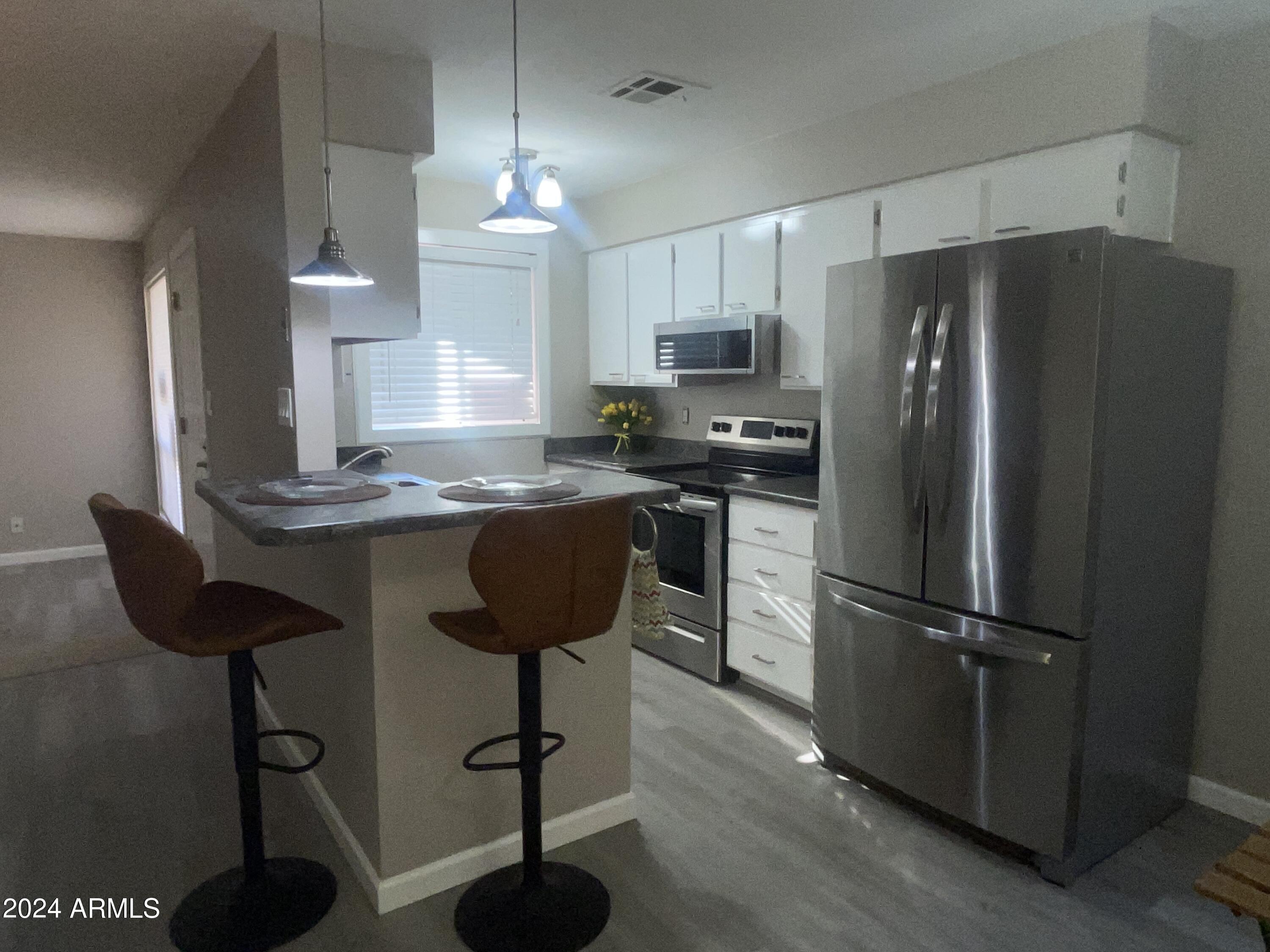93 North Cooper Road, Unit 17 Chandler, AZ 85225 - Photo 7 of 33 IMG_3562
