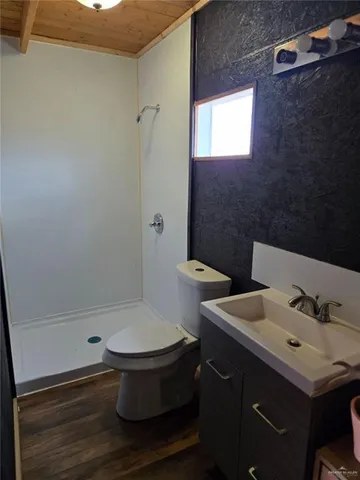 a bathroom with a sink and a toilet