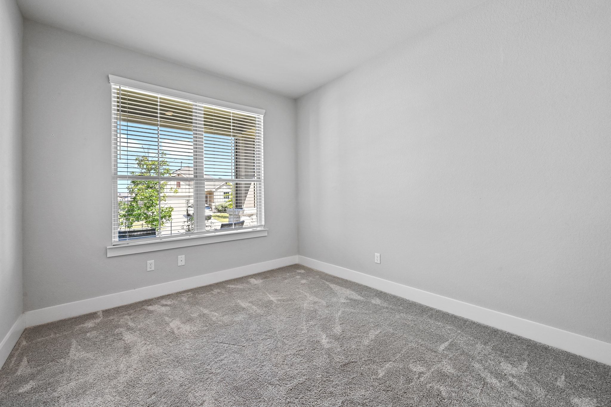 284 Grace Lilly Drive Buda, TX 78610 - Photo 24 of 40 an empty room with a window