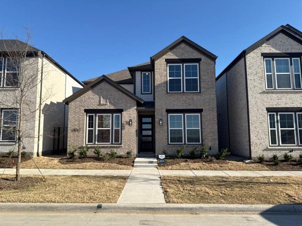 7013 Lathrop Lane Frisco, TX 75033 - Photo 1 of 26 View of front of property featuring brick siding