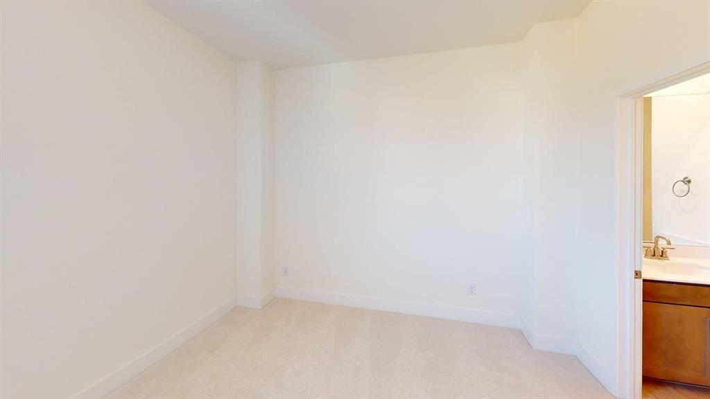 7013 Lathrop Lane Frisco, TX 75033 - Photo 13 of 26 Spare room with light colored carpet and baseboards