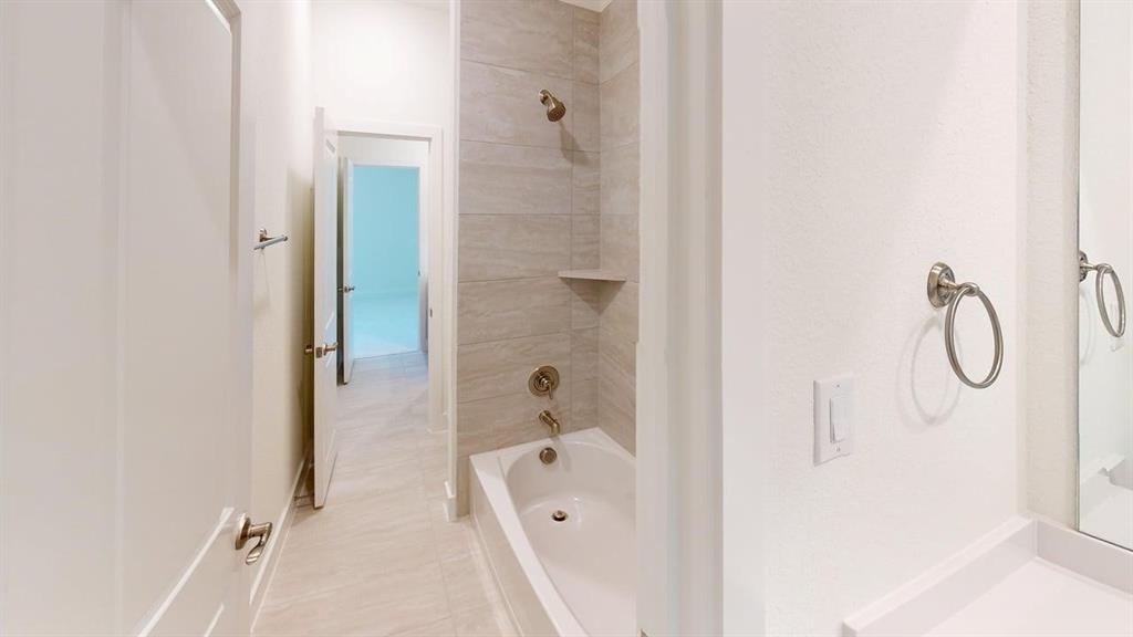 7013 Lathrop Lane Frisco, TX 75033 - Photo 19 of 26 Bathroom with shower combination
