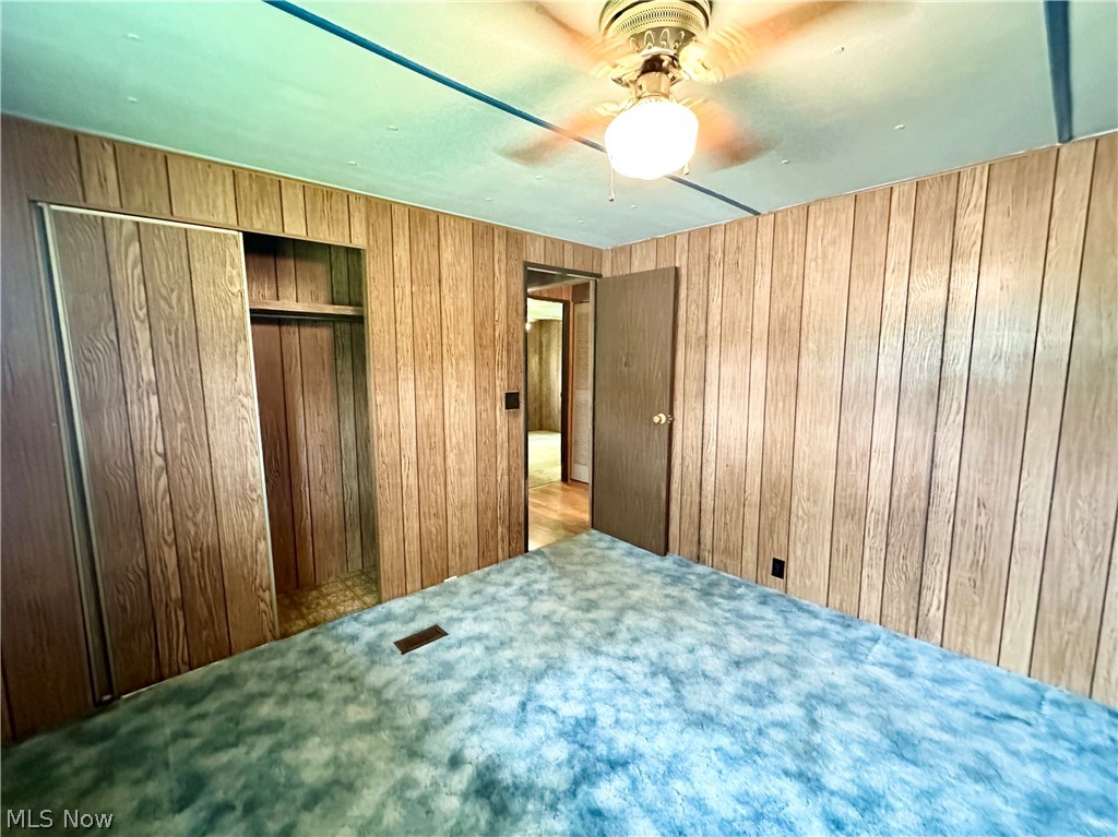 28 Richter Road Colliers, WV 26035 - Photo 13 of 38 Bedroom featuring ceiling fan and carpet flooring