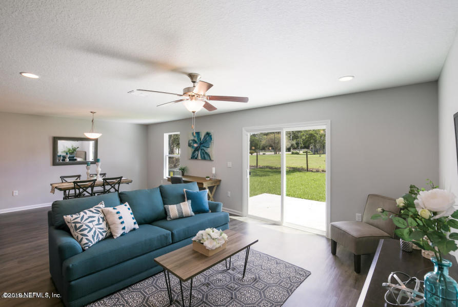 2253 Bayview Road Jacksonville, FL 32210 - Photo 5 of 15 a living room with furniture and a window