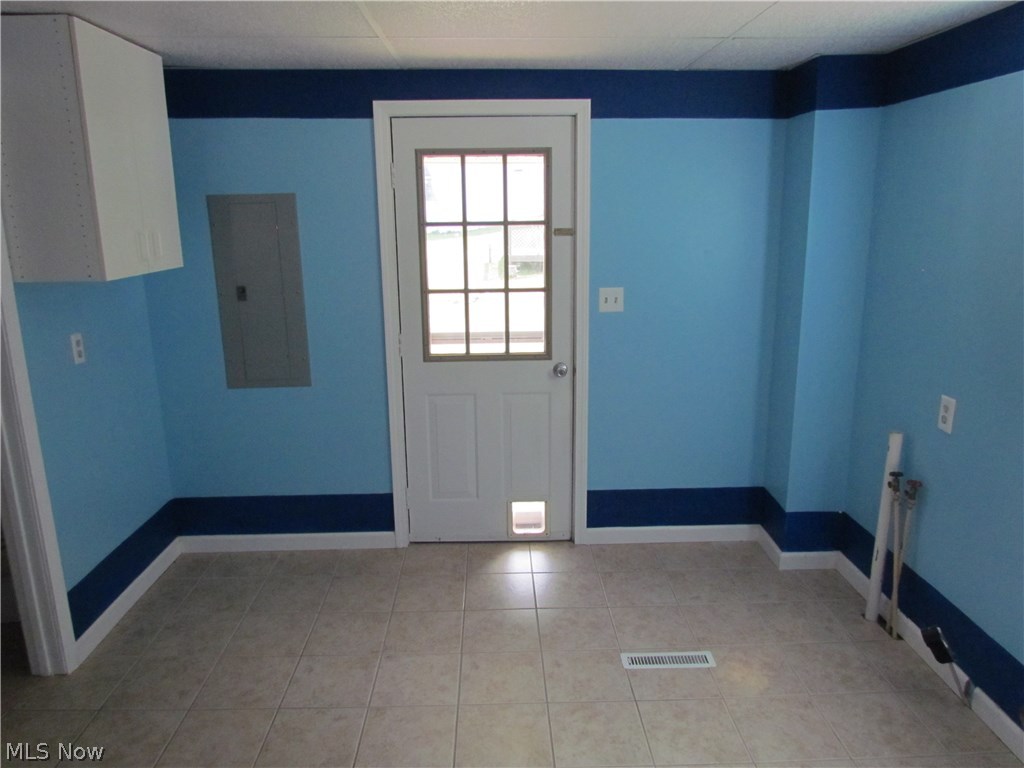 65 Bently Road Walker, WV 26180 - Photo 11 of 21 Laundry room (cat entry in the door has been removed)