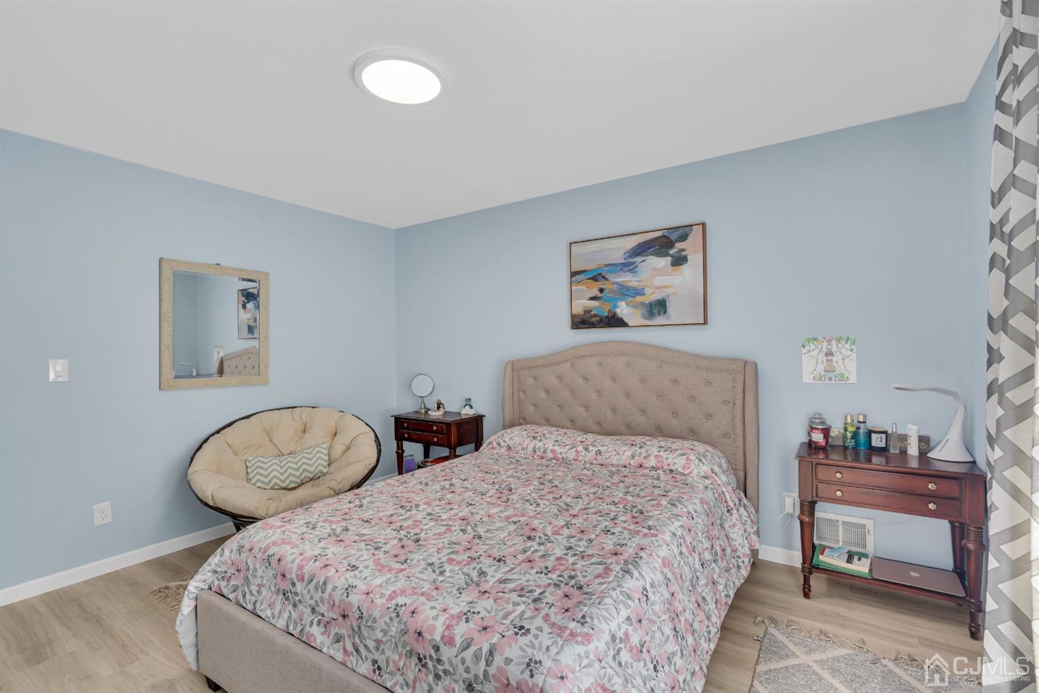 76 Bethany Road Hazlet, NJ 07730 - Photo 20 of 33 a bedroom with a bed and a lamp on dresser