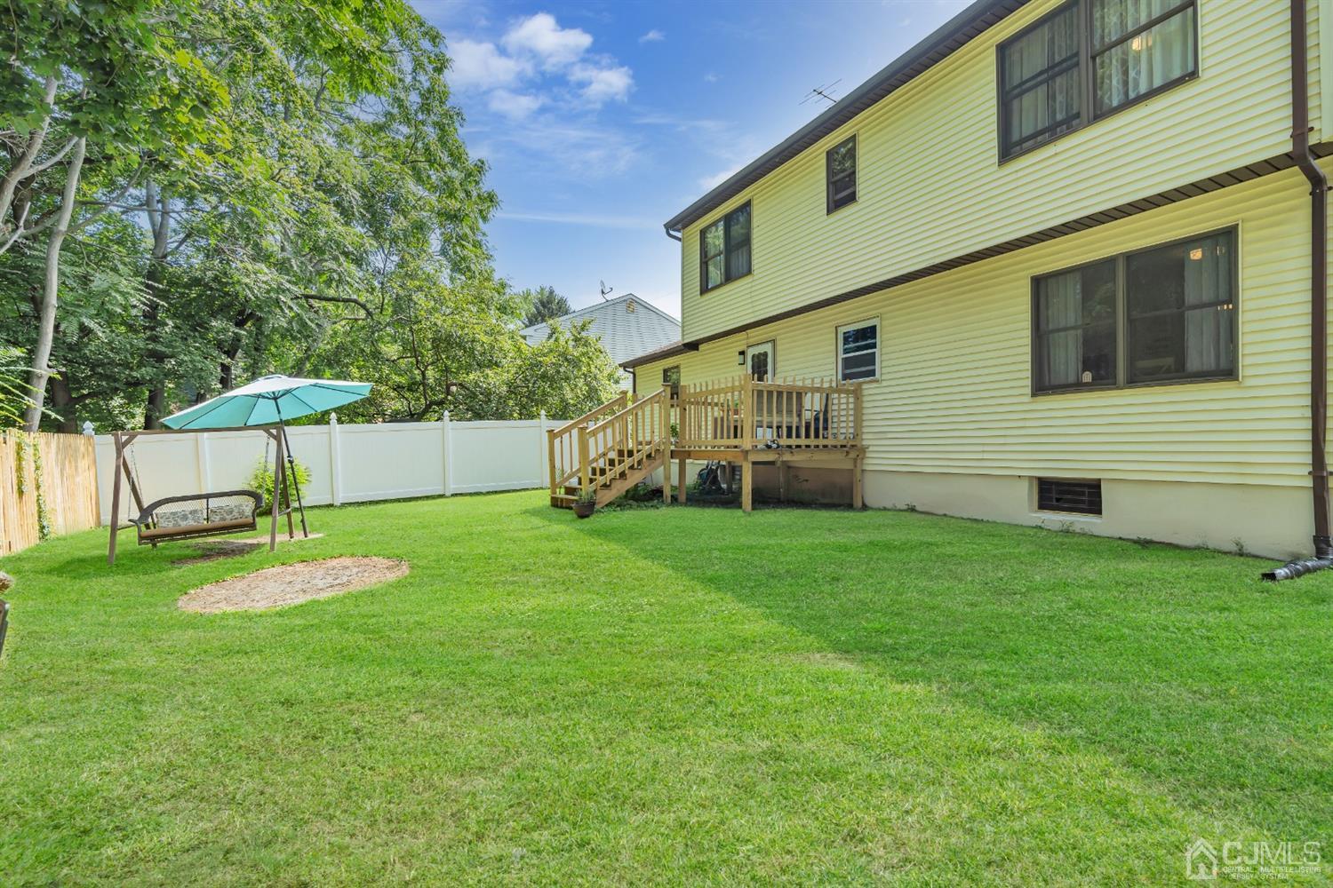 76 Bethany Road Hazlet, NJ 07730 - Photo 30 of 33 a backyard of a house with lots of green space
