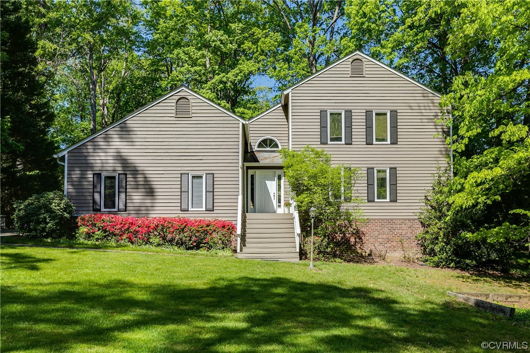 4000 Cheyenne Road Richmond, VA 23235 - Photo 1 of 50 a front view of house with yard