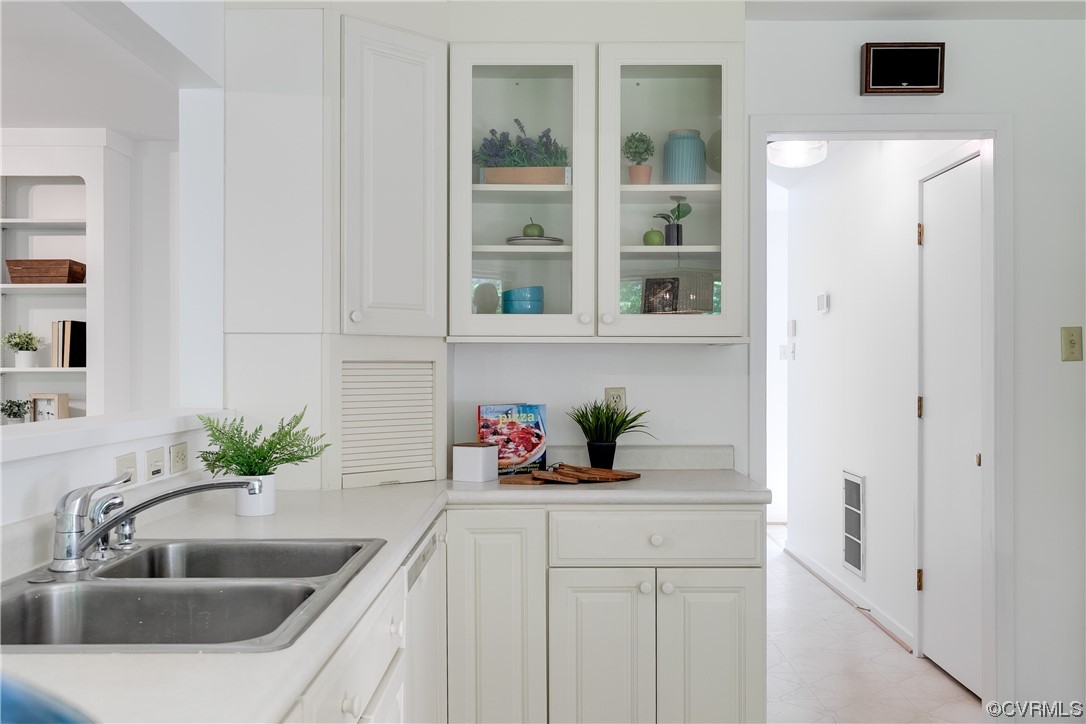 4000 Cheyenne Road Richmond, VA 23235 - Photo 16 of 50 a kitchen with a sink and a potted plant