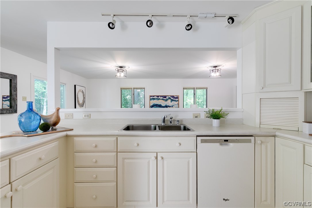 4000 Cheyenne Road Richmond, VA 23235 - Photo 18 of 50 a kitchen with white cabinets and sink